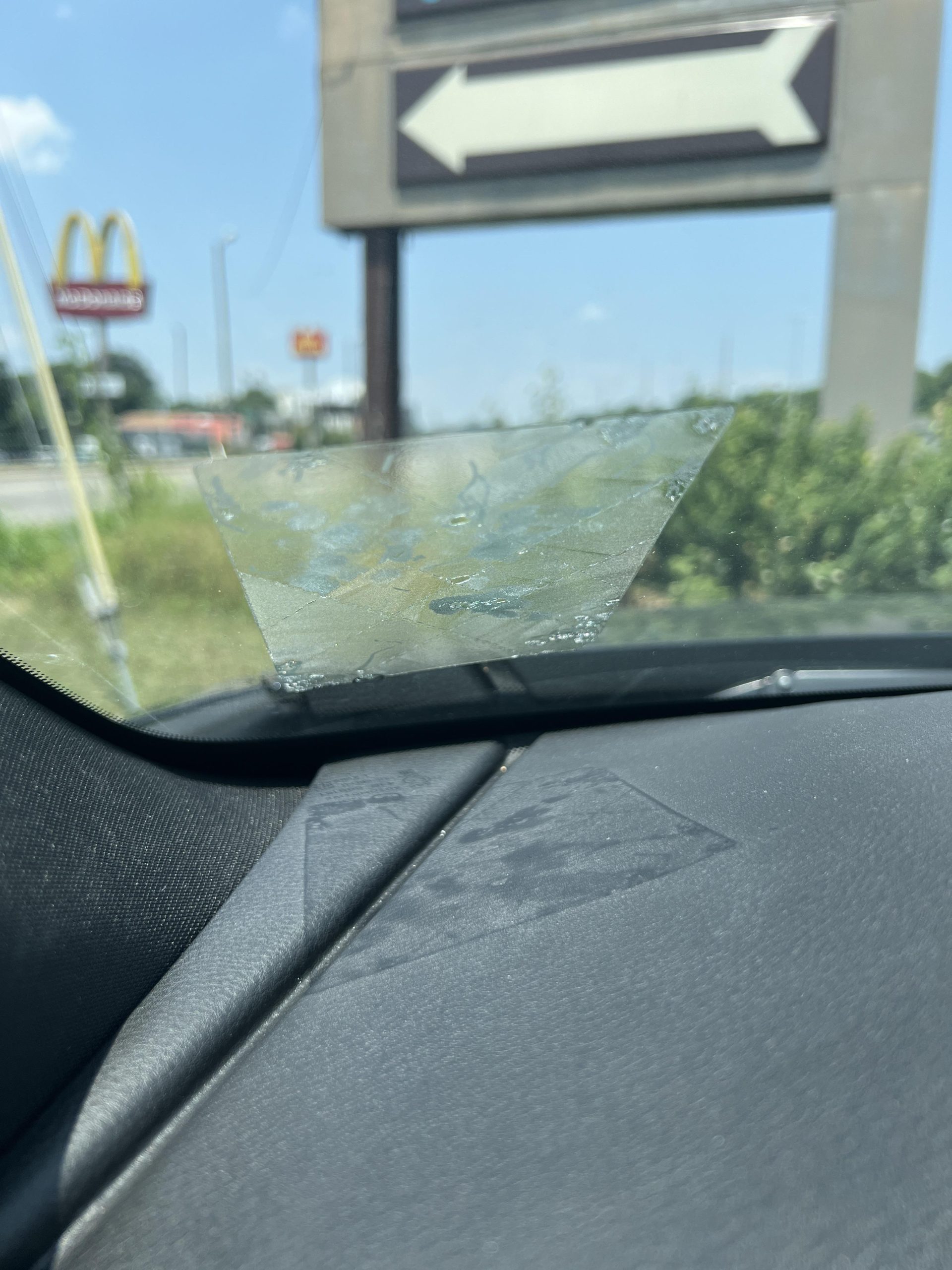 How to Remove Adhesive from Car Glass